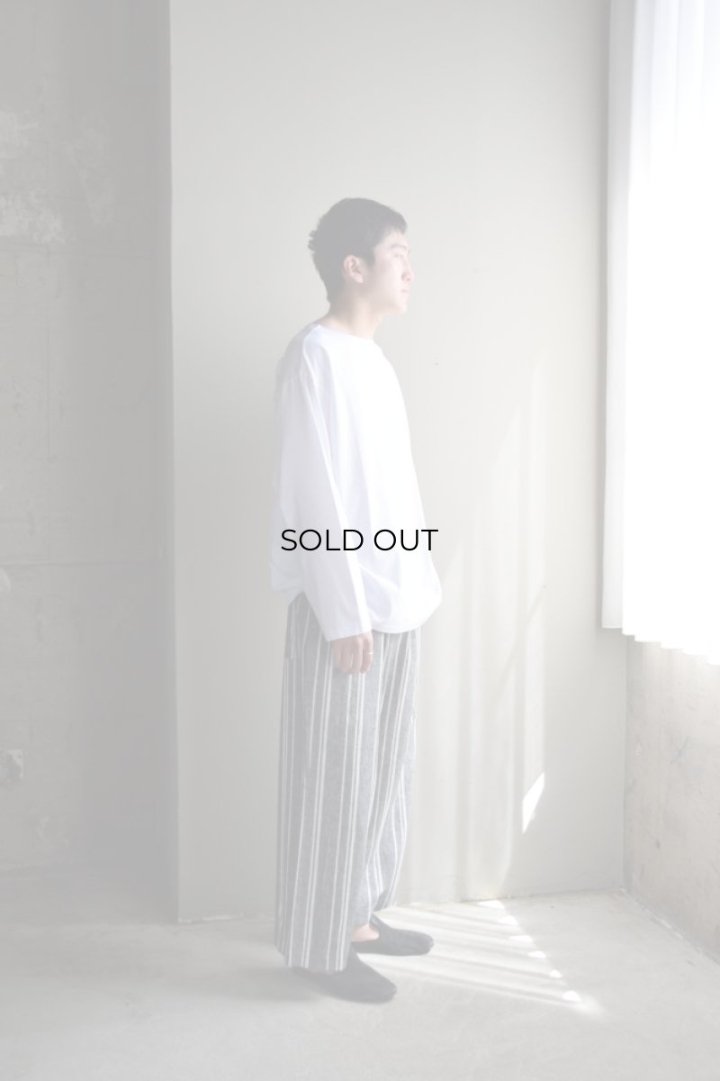 身長175cm、体重62kgの体型でサイズFの着用例